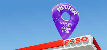 Esso station canopy with a purple nectar pin on top to show where you can collect & spend nectar points.